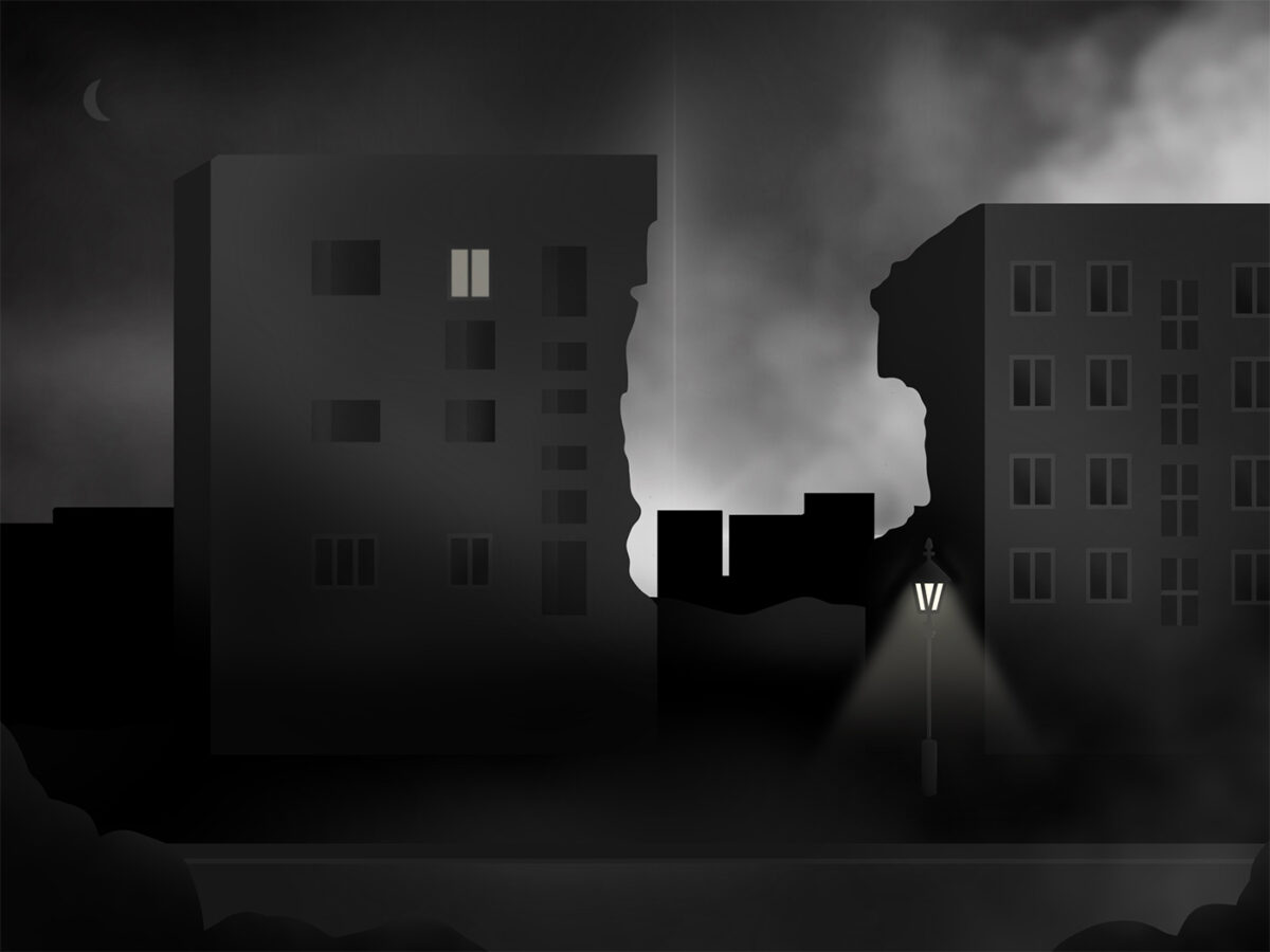 Zerstörtes Häuserblock in Kiew bei Nacht.